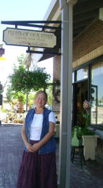 Teddi standing in front of Fruits of Our Spirit. Visit them for Country Bubbles soaps and primitive style home decor!